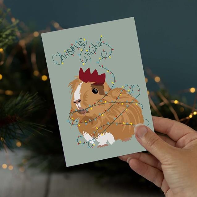 Treacle the Guinea Pig Wrapped in Lights Christmas Card